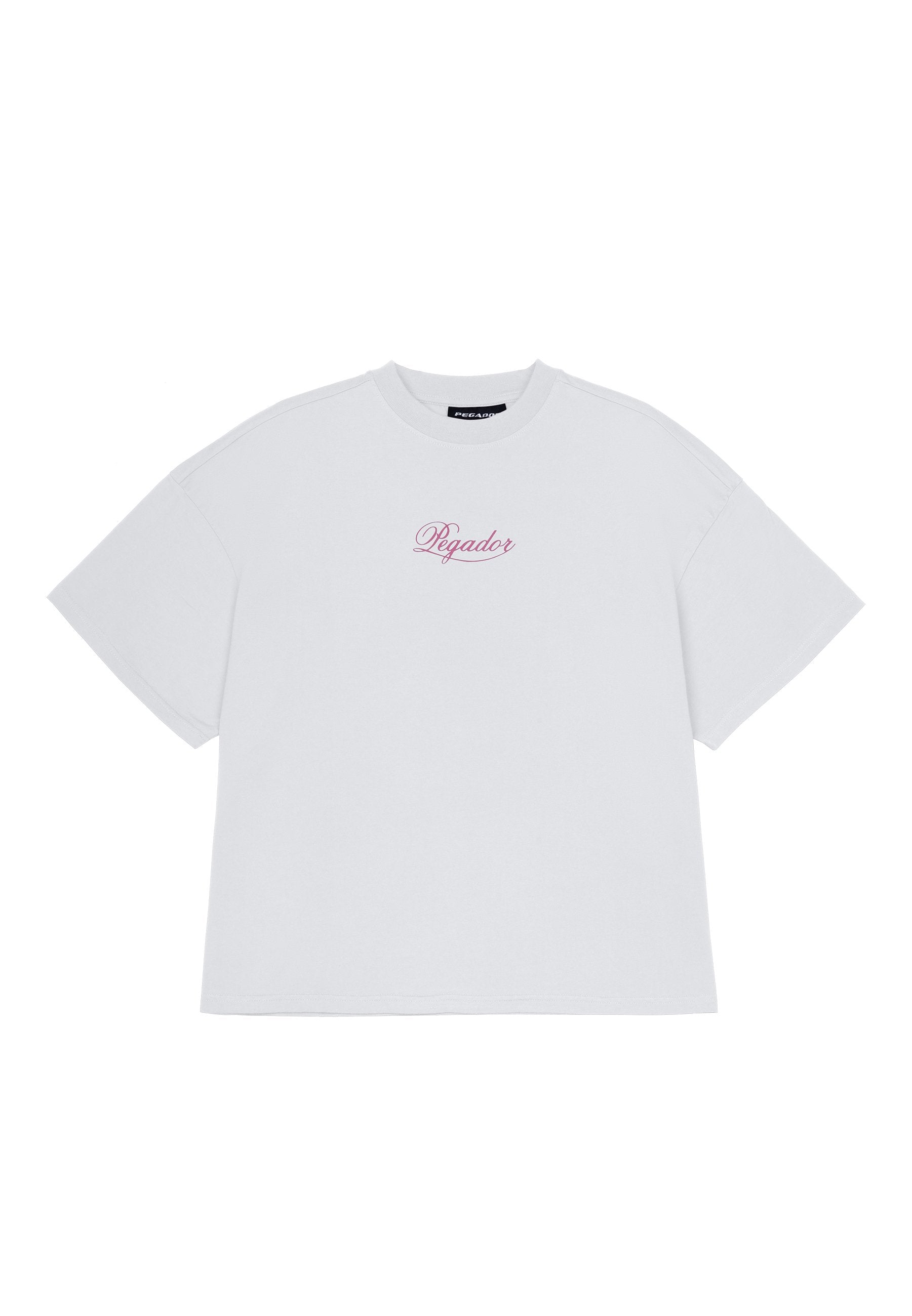 Weißes Baumwoll-T-Shirt in lockerer Passform mit kurzen Ärmeln und einem pinken, gestickten "Pegador"-Schriftzug auf der Brust.