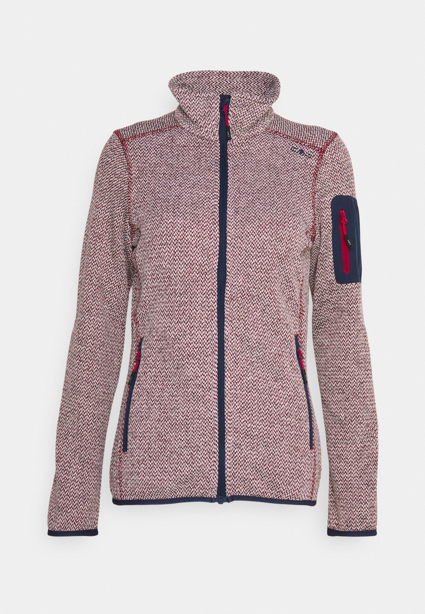 Jacke mit rot-blauem Hahnentrittmuster, hohem Kragen, Reißverschluss vorne und Seitentaschen. Mit kontrastierendem blauen Ellbogenpatch und Reißverschluss.
