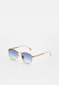 Goldene Metall-Sonnenbrille mit gradienten blauen Gläsern, ovaler Form, schmalen Bügeln und einem minimalistischen Design. Enthält ein kleines Markenlogo auf dem Glas.