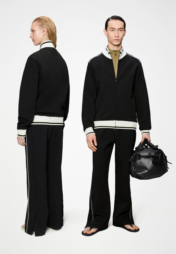Rains DOWNTIME UNISEX