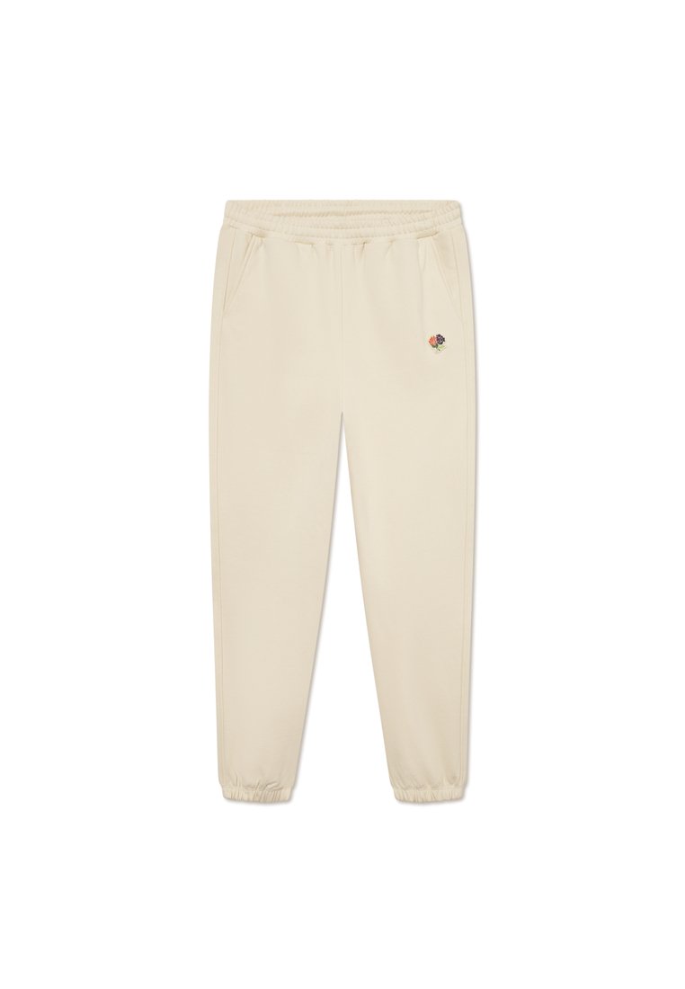 Beige Sweatpants mit elastischem Bund und Bündchen, ausgestattet mit zwei Seitentaschen und einem kleinen gestickten Blumenmotiv auf der Vorderseite.