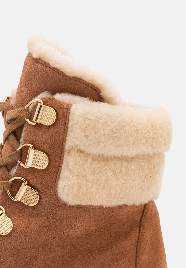 Stuart Weitzman NOHO HIKER CHILL BOOTIE