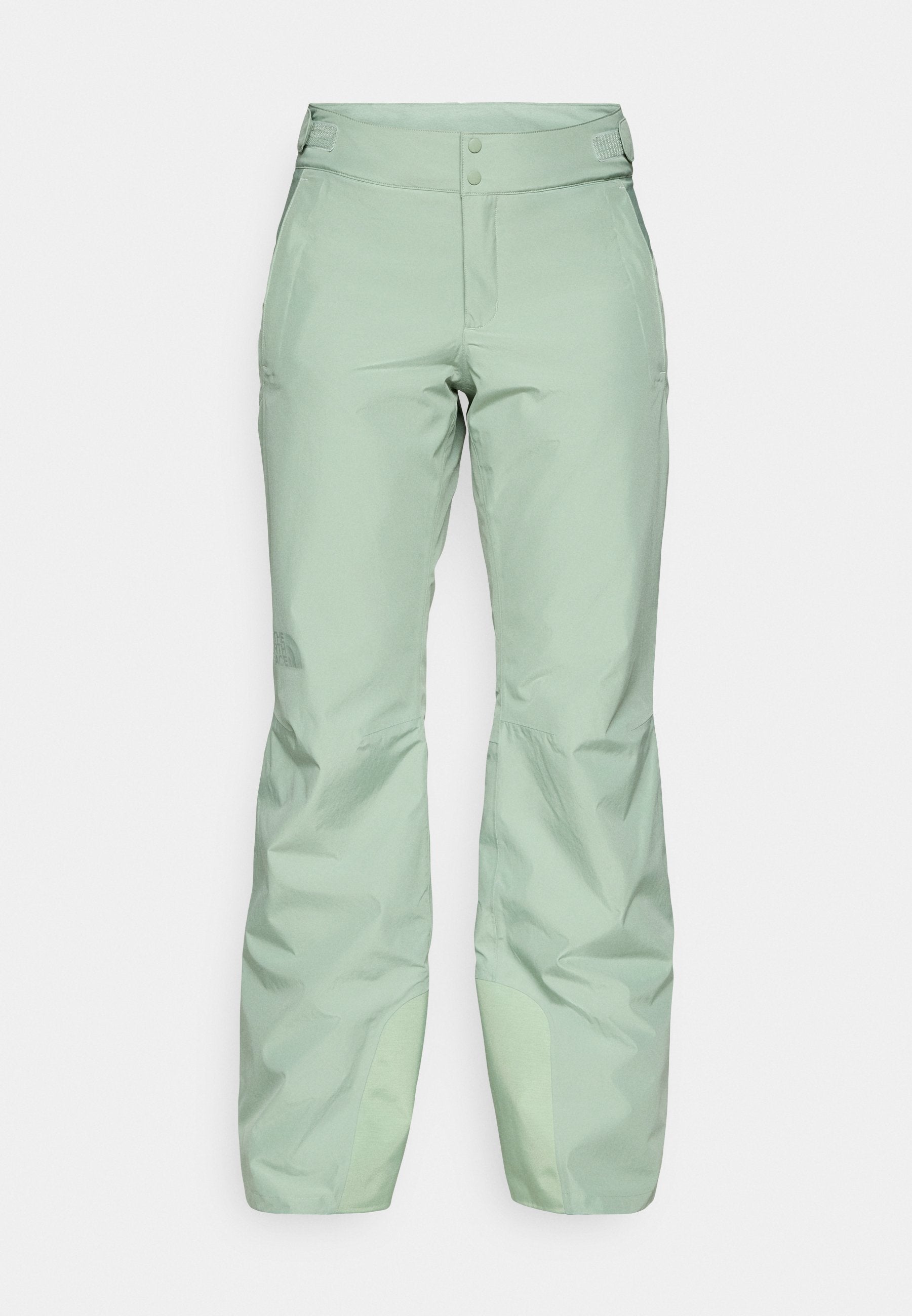 Helle grüne Outdoor-Hosen aus einem glatten, wasserabweisenden Material. Verfügt über zwei Knöpfe am Bund und verstärkte untere Bereiche.