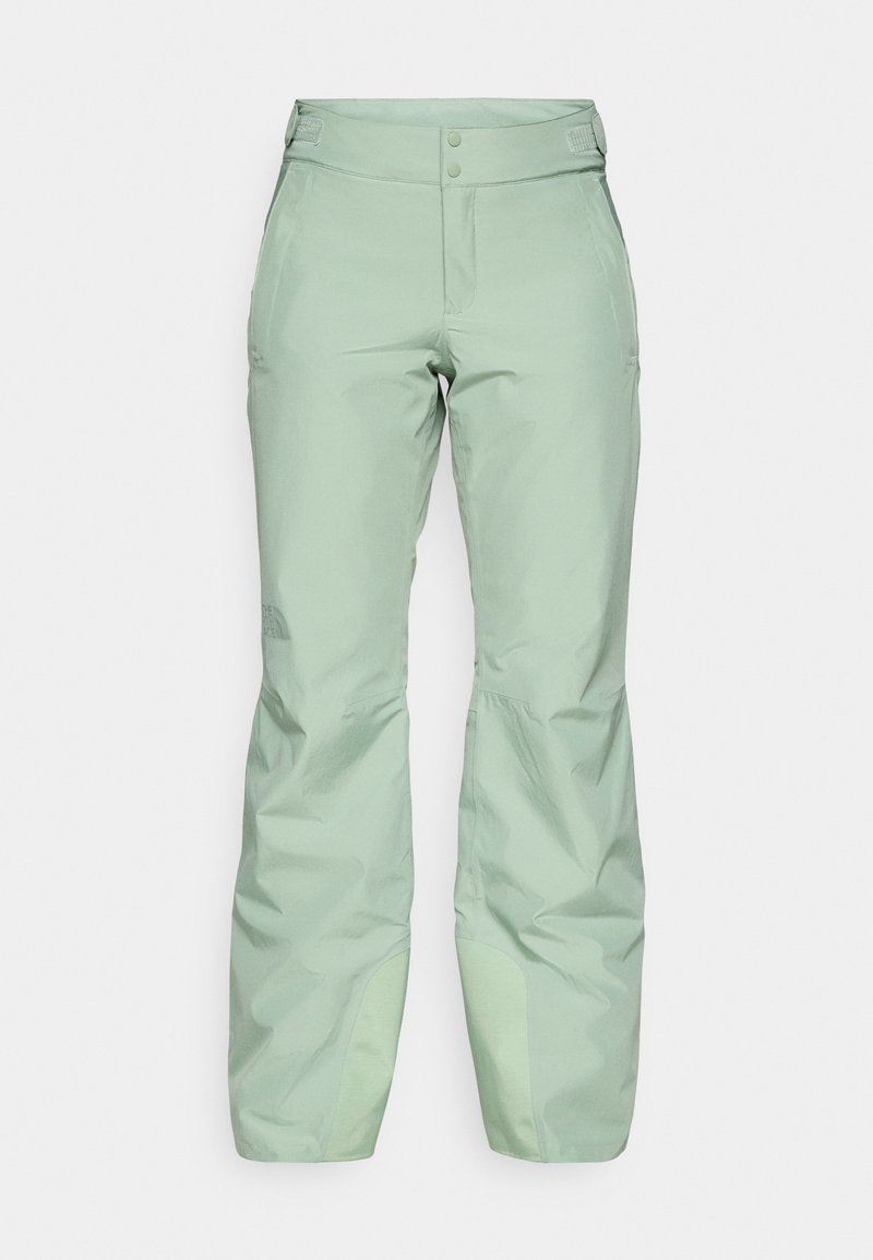 Helle grüne Outdoor-Hosen aus einem glatten, wasserabweisenden Material. Verfügt über zwei Knöpfe am Bund und verstärkte untere Bereiche.