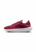 Nike Free Sneakers mit einem roten Mesh-Obermaterial, schwarzfarbenem Logo, strukturierten Details und einer weißen flexiblen Sohle, die für Komfort und Atmungsaktivität konzipiert sind.
