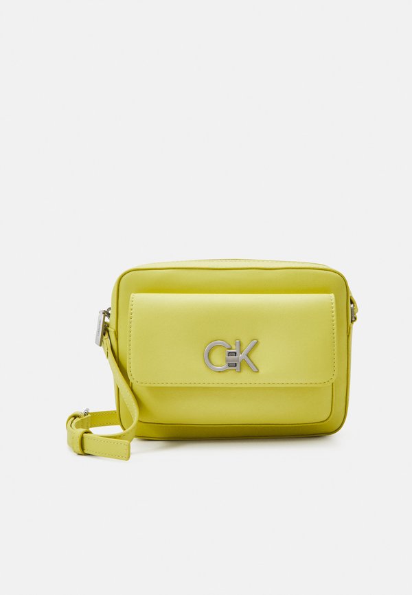 Calvin Klein RE LOCK CAMERA BAG - Cross body bag - yellow