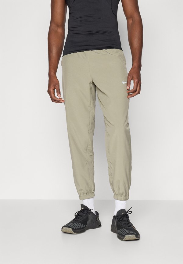 Nike Performance FORM - Tracksuit bottoms - light army/black/reflective silver-coloured