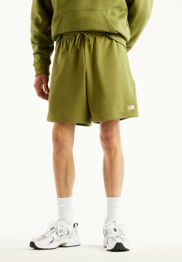 New Balance NEW BALANCE  SHORT 7" - Sports shorts - sport green