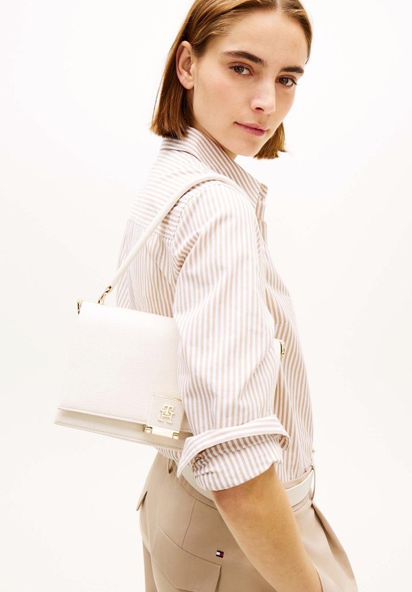 Tommy Hilfiger HER MED CROSSOVER - Handbag - soft cream