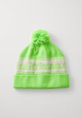 Neongrün gestrickte Mütze mit umgeschlagenem Saum, ausgestattet mit einem weißen Band mit dem Text "Peak Performance" und einem Pompon oben.