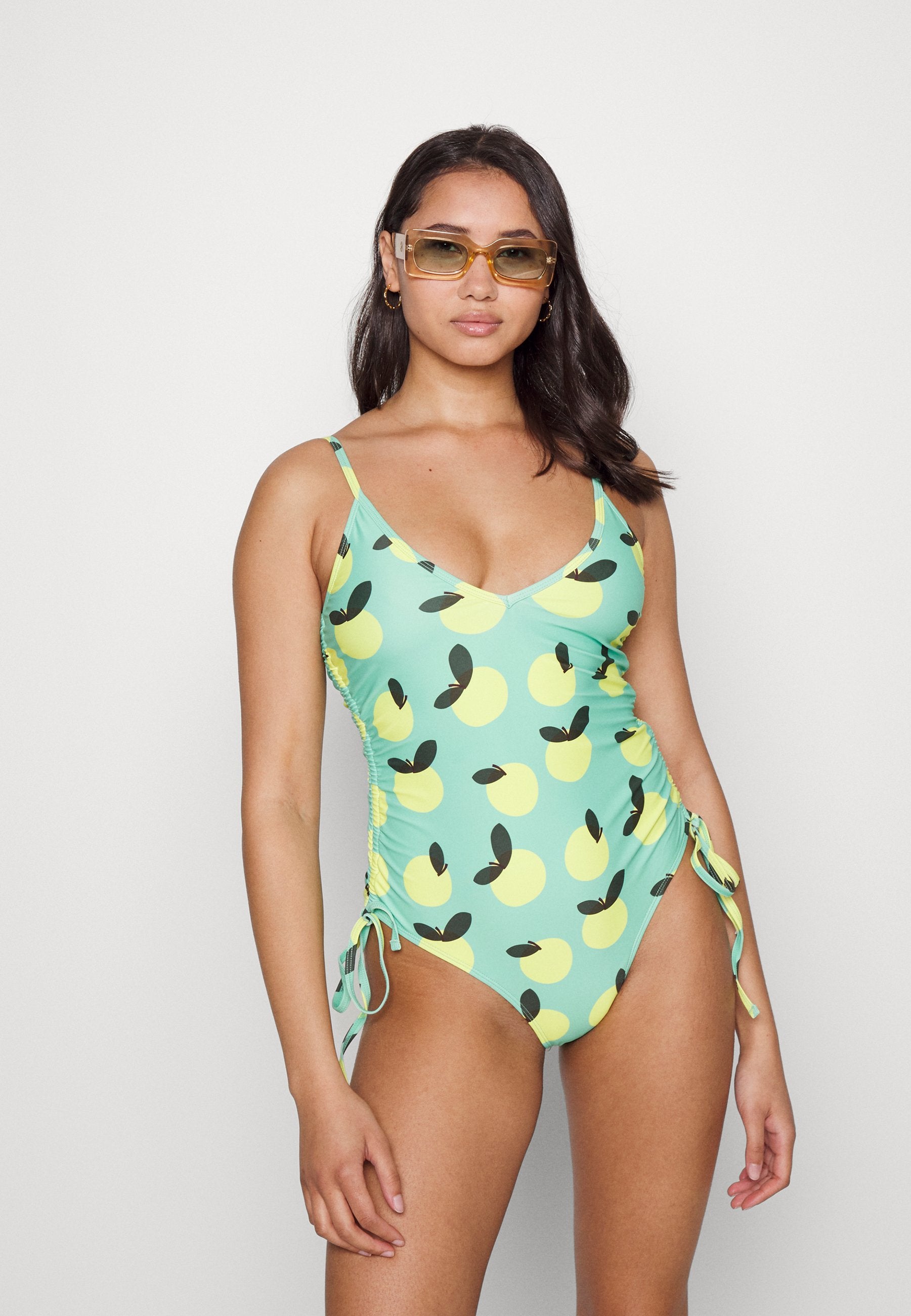 We Are We Wear NICOLA GATHERED SIDE PLUNGE SWIMSUIT IN LEMON PRINT