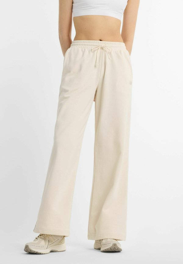 New Balance COASTAL  - Tracksuit bottoms - linen
