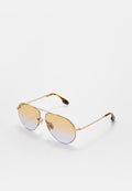 Goldfarbene Flieger-Sonnenbrille mit verlaufenden Gläsern, die von Bernstein bis helllila übergehen, und Bügelenden im Schildpatt-Muster.