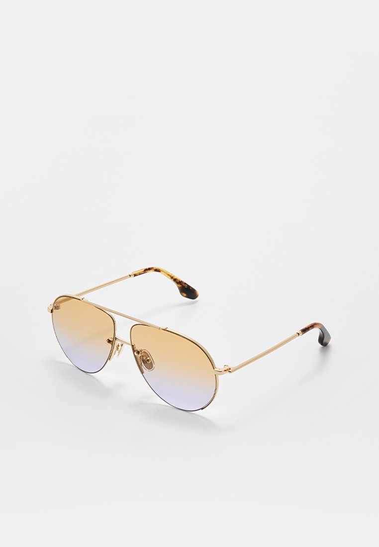 Goldfarbene Flieger-Sonnenbrille mit verlaufenden Gläsern, die von Bernstein bis helllila übergehen, und Bügelenden im Schildpatt-Muster.