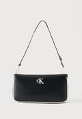 Calvin Klein CONTRAST CONVERTIBLE POUCH - Handbag - black
