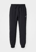 New Balance SPORT ESSENTIALS JOGGER - Tracksuit bottoms - black