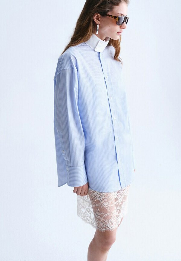 Mango ADULT - Button-down blouse - blue off-white