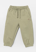 Hellgrüne Sweatpants mit elastischem Bund, verstellbarem Kordelzug, Seitentaschen und elastischen Bündchen, aus weichem, strukturiertem Stoff.