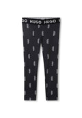 Schwarze Leggings mit einem HUGO-Logo-Muster in Weiß. Mit einem elastischen Bund und kontrastierenden Schriftzügen. Aus glattem, leichtem Stoff.