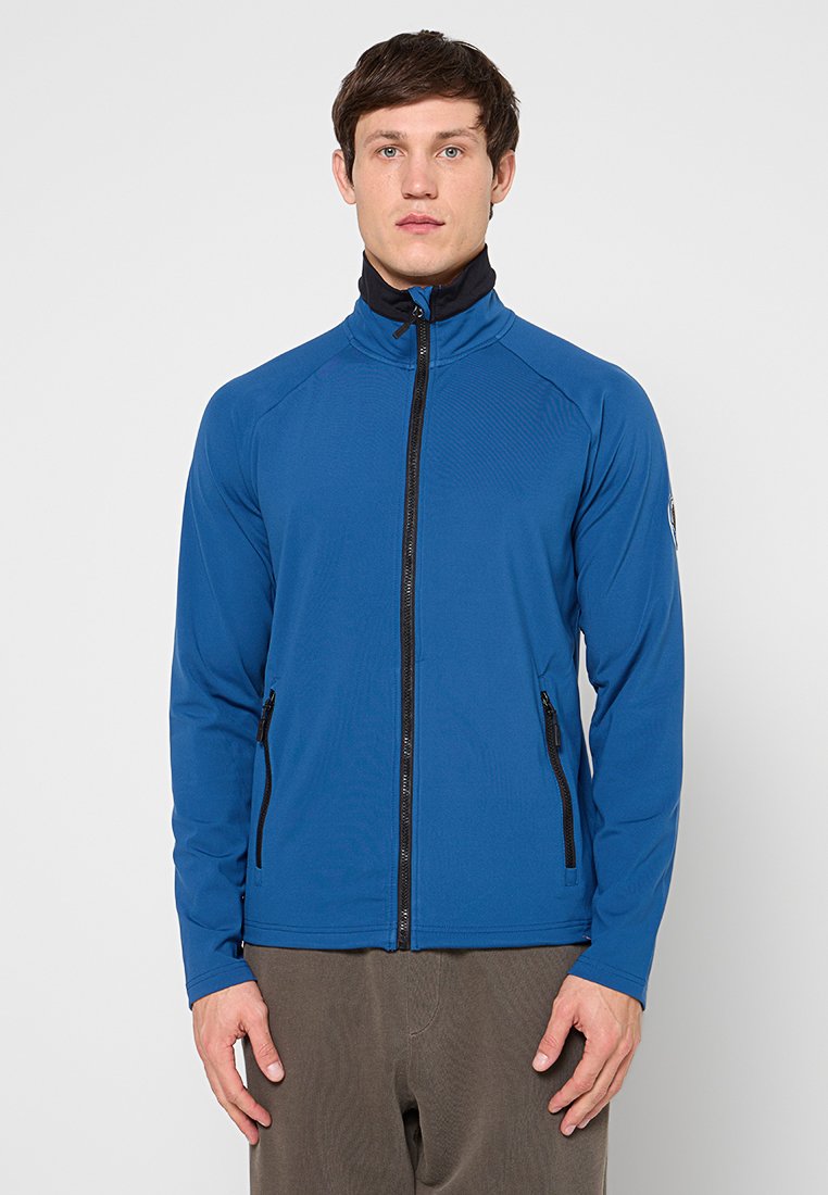 Blaue Softshell-Jacke mit Reißverschluss vorne, hohem Kragen und zwei Reißverschlusstaschen. Verfügt über eine strukturierte Stoffoberfläche und kontrastierende schwarze Akzente.