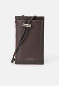 Calvin Klein EMBOSS PHONE CROSSBODY - Phone pouch - dark brown