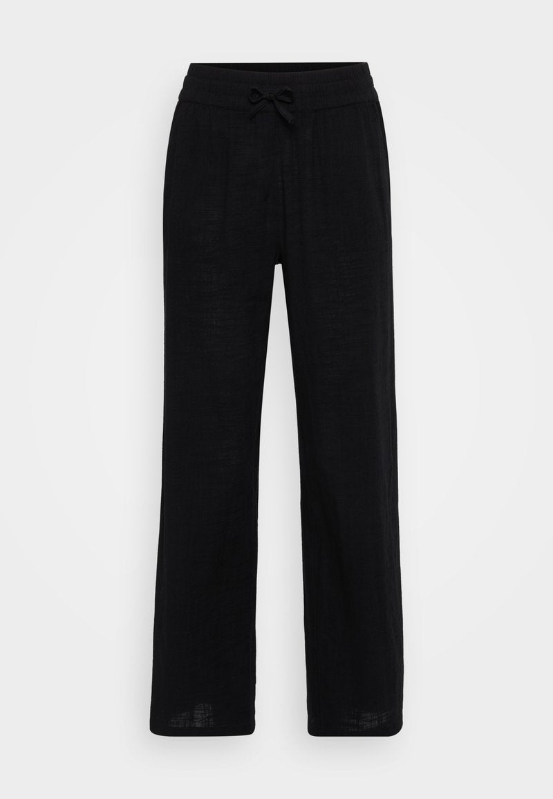 Schwarze Leinen-Haremshose mit elastischem Bund und Kordelzug. Glatte Textur, atmungsaktives Material und bodenlanger Schnitt.