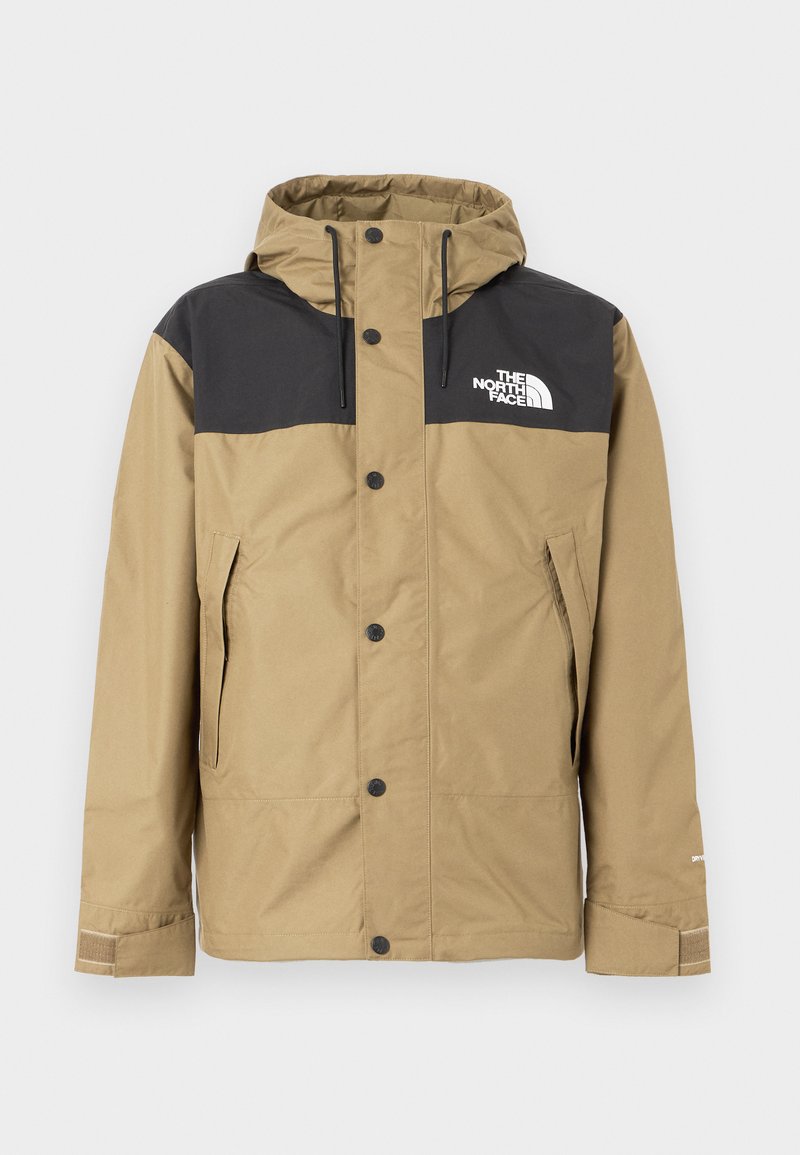 Braun-schwarze zweifarbige Jacke mit Kapuze, Knopfverschluss und seitlichen Taschen. Das Material ist wahrscheinlich wetterbeständig und hat eine glatte Textur.