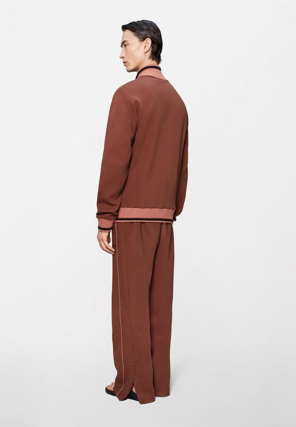 Rains DOWNTIME UNISEX