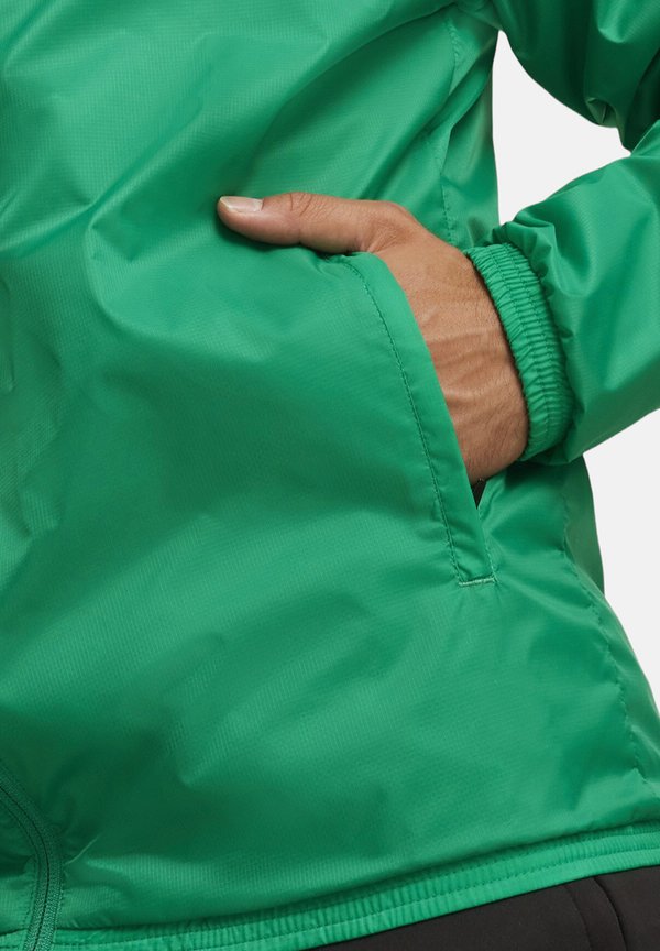 Puma TEAMGOAL ALL WEATHER  - Waterproof jacket - gruenweiss