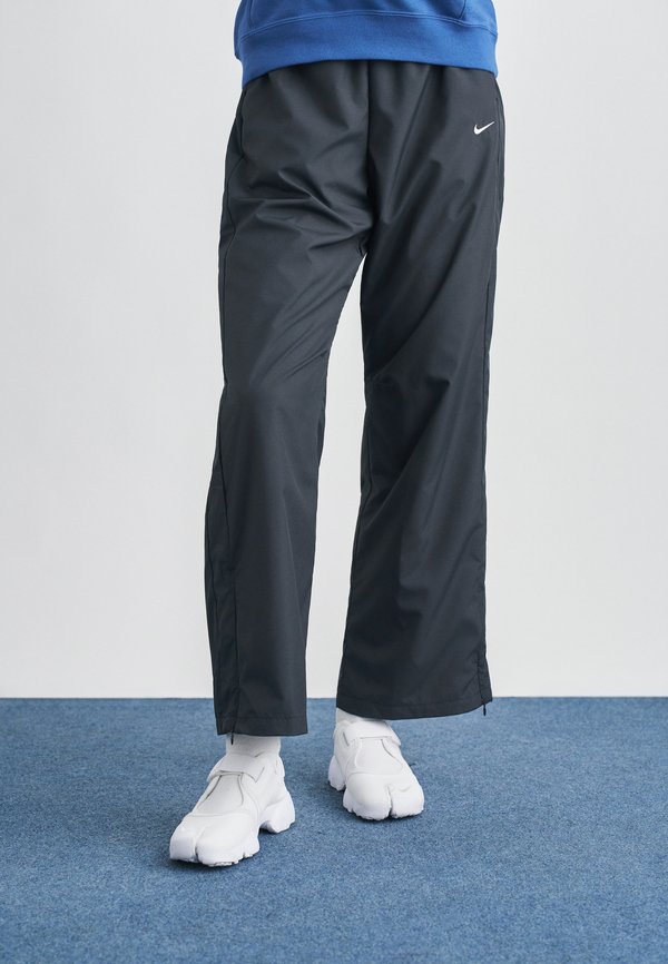 Nike Sportswear Tracksuit bottoms - black/sail