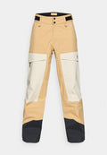 Beige und weiße Outdoor-Hosen mit schwarzen Akzenten. Verfügt über Cargo-Taschen, einen doppelten Knopfverschluss und eine strapazierfähige Textur, die für verschiedene Bedingungen geeignet ist.