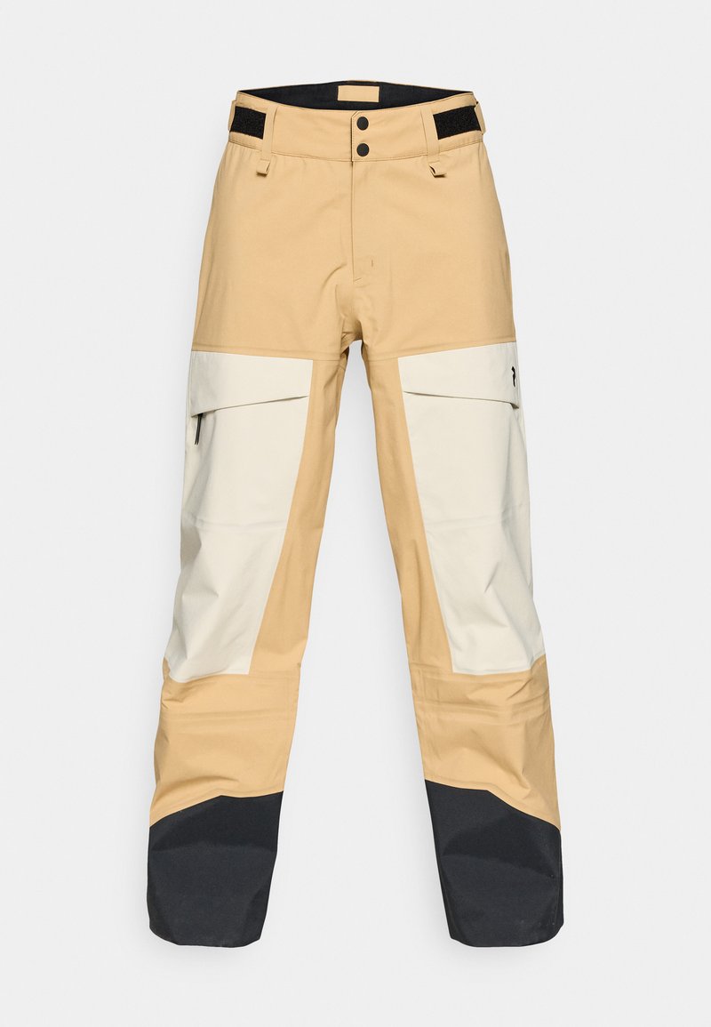 Beige und weiße Outdoor-Hosen mit schwarzen Akzenten. Verfügt über Cargo-Taschen, einen doppelten Knopfverschluss und eine strapazierfähige Textur, die für verschiedene Bedingungen geeignet ist.