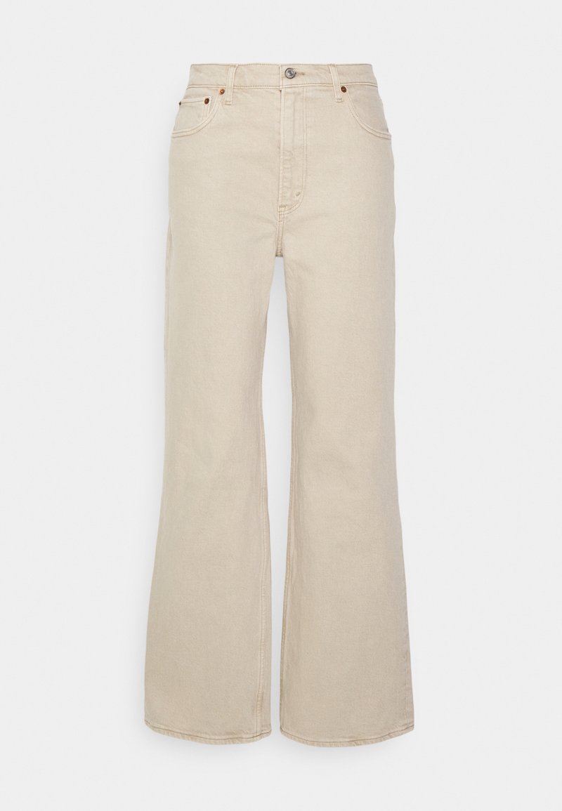 Beige weite Jeans aus Denim, mit einem klassischen Fünf-Taschen-Design, vorderem Knopfverschluss und sichtbaren Nähdetails.