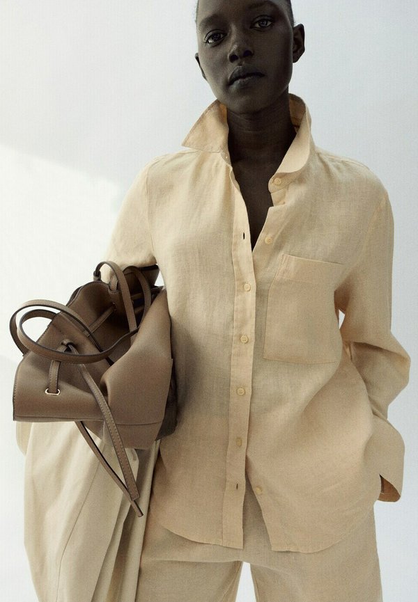 Mango ADULT - Button-down blouse - light yellow