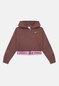 Brauner Reißverschluss-Hoodie von Nike mit Kapuze und rosa elastischem Bund mit dem Schriftzug "NIKE PRO" sowie weißem Nike-Swoosh auf der Brust.