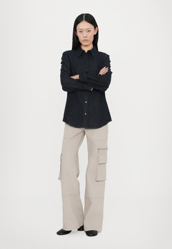 CLOSED SEAMING SHIRT
