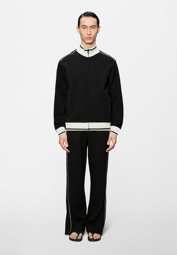 Rains DOWNTIME UNISEX