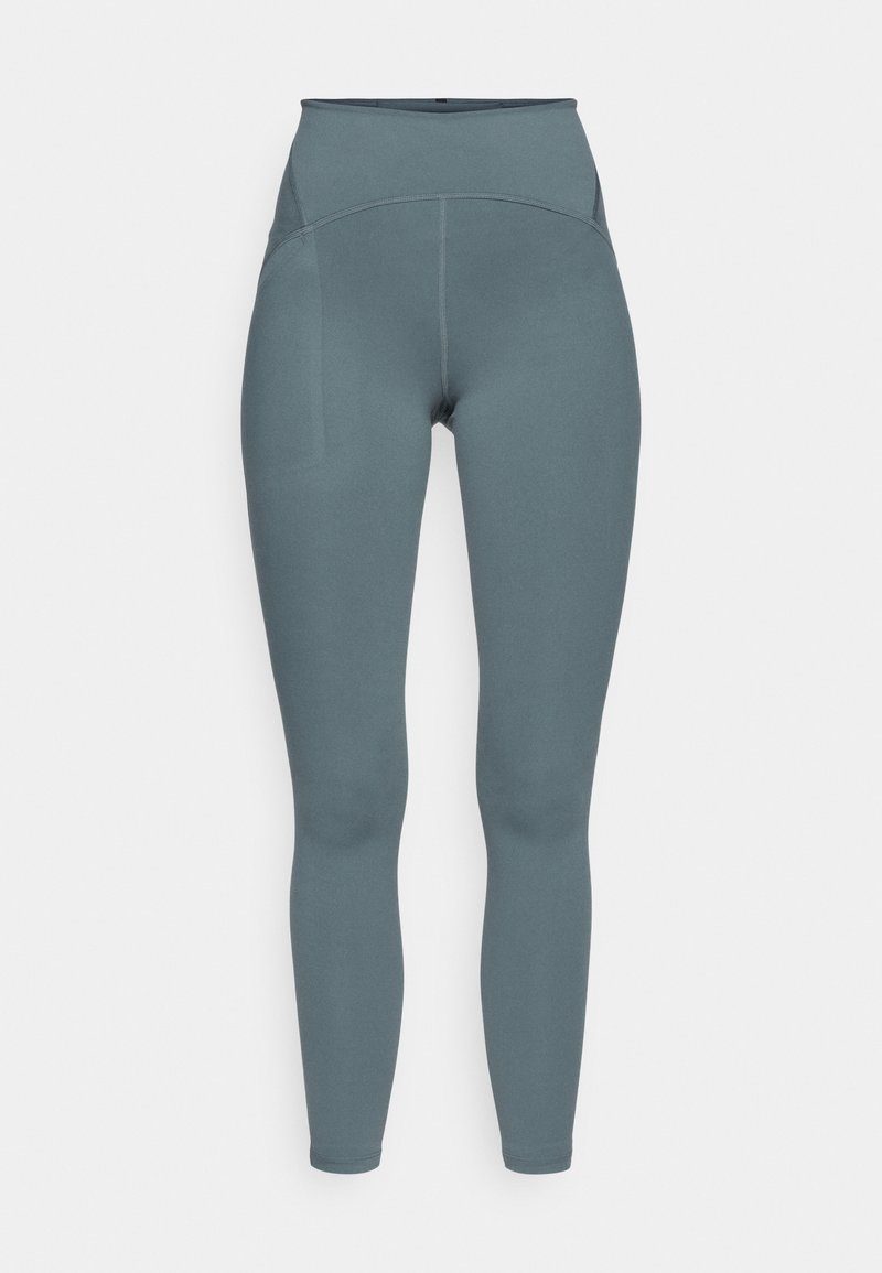 Hoch taillierte, bodenlange Leggings aus glattem, elastischem Stoff in einem gedämpften Blau-Grau; verfügt über ein dezentes Nahtdesign und eine Seitentasche.