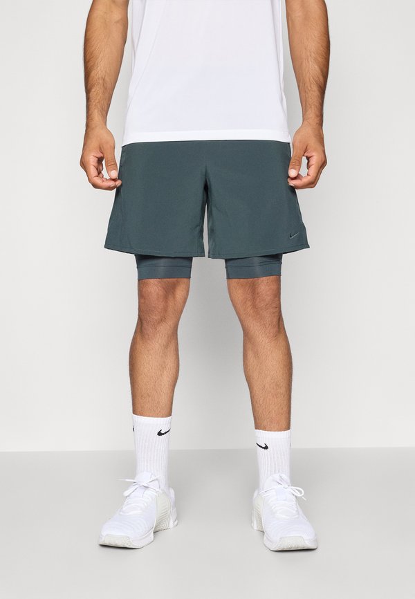 Nike Performance UNLIMITED - Sports shorts - seaweed/black
