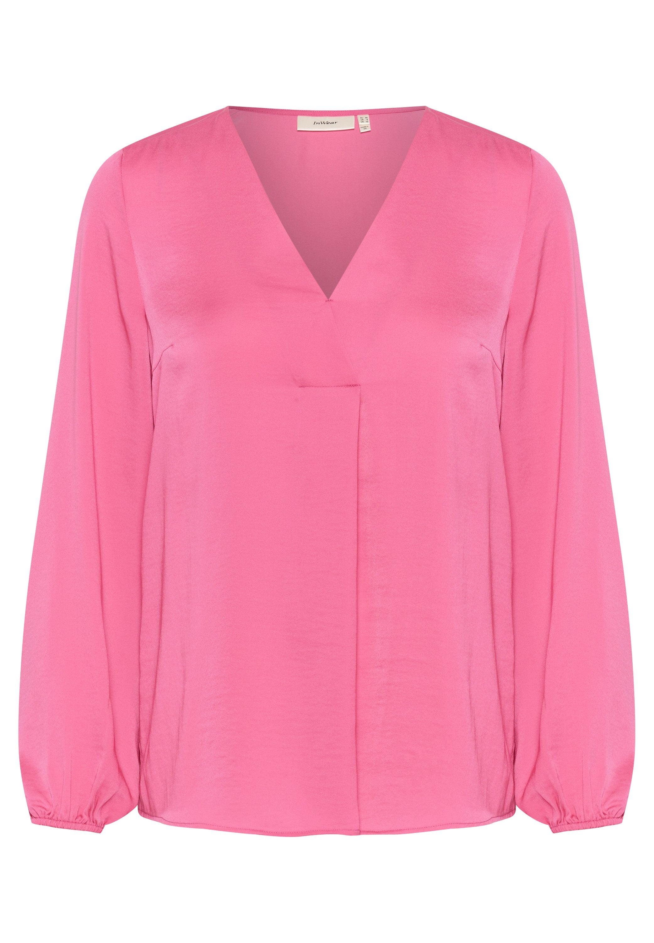 Rosa Bluse aus einem glatten Stoff mit einem V-Ausschnitt, langen Ärmeln mit elastischen Bündchen und einem zentralen Falten-Detail.