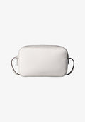 Calvin Klein FOIL LOGO ELONGATED CAMERA - Cross body bag - white alyssum