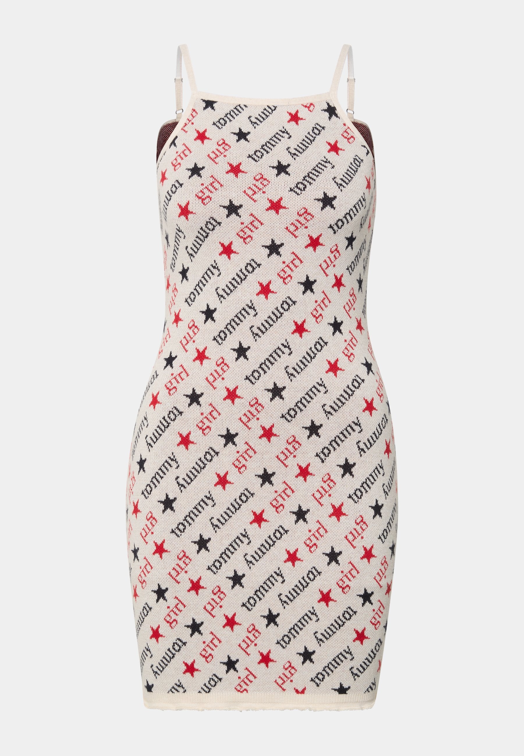 Figurbetontes Kleid aus Strickstoff mit einem cremigen Grundton, der mit wiederholtem Text in Schwarz und Rot sowie Sternmustern versehen ist. Mit Spaghettiträgern.