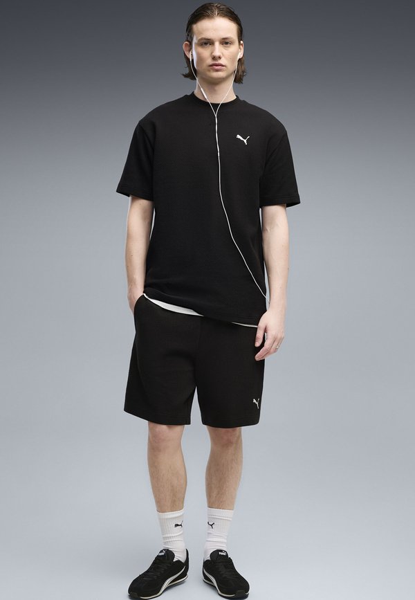 Puma ESSENTIALS ELEVATED RELAXED T-SHIRT - Basic T-shirt - black