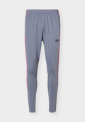 Under Armour CHALLENGER TRAINING - Tracksuit bottoms - titan gray/black/white