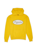 Gelbe Kapuzenjacke mit einer vorderen Kängurutasche und einem ovalen grafischen Etikett mit dem Text "Pegador" in einer geschwungenen Schriftart. Material aus Baumwollmischung.