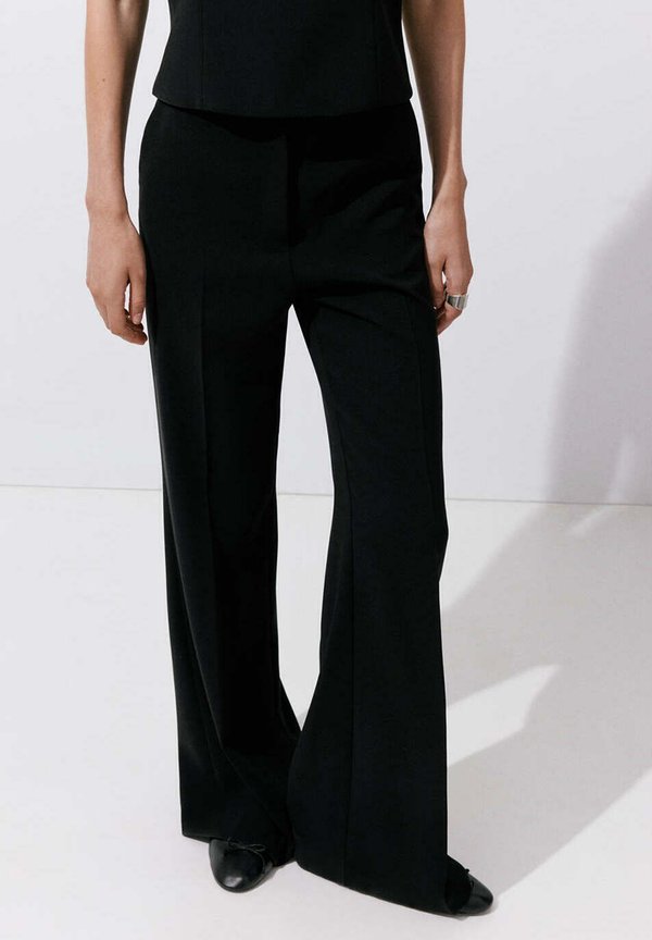 Mango ADULT - Trousers - black