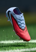 Nike Performance PHANTOM 6 LOW PRO FG UNISEX - Firm-ground football boots - royal tint/bright crimson