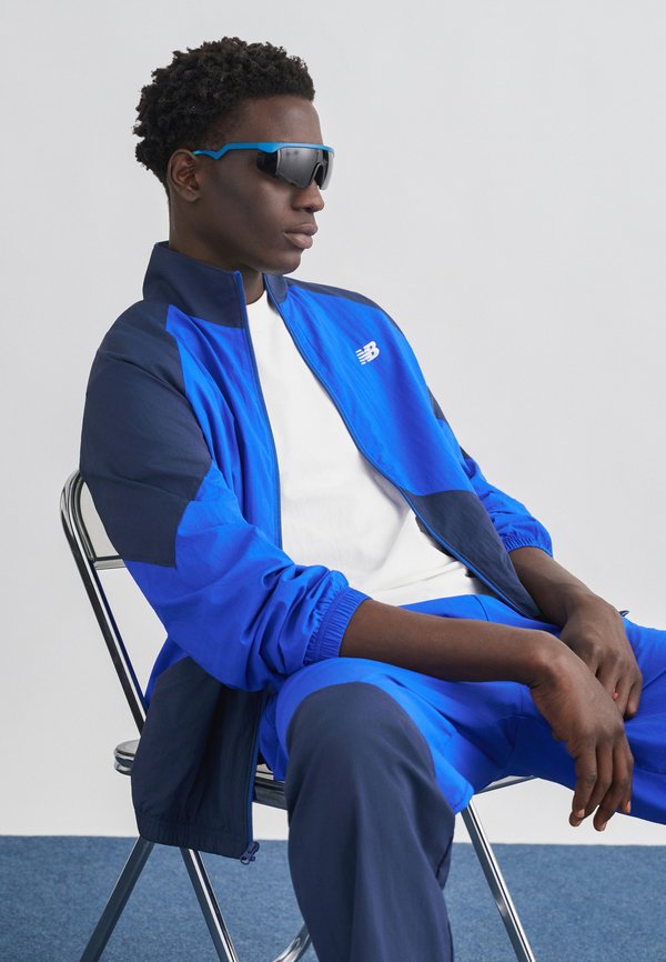 New Balance SPORT LEGACY JACKET - Light jacket - navy