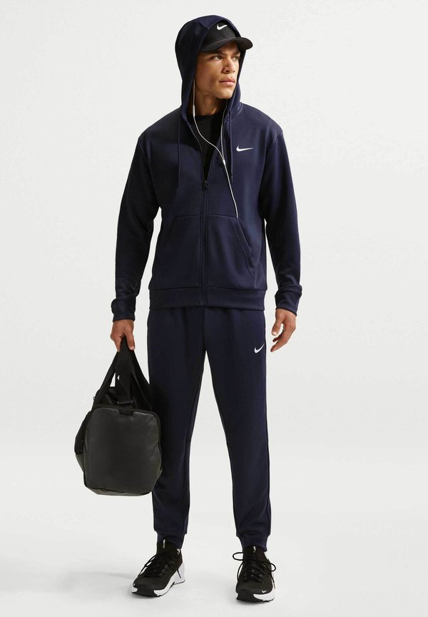 Nike Performance FLEX - Tracksuit bottoms - obsidian/obsidian/white