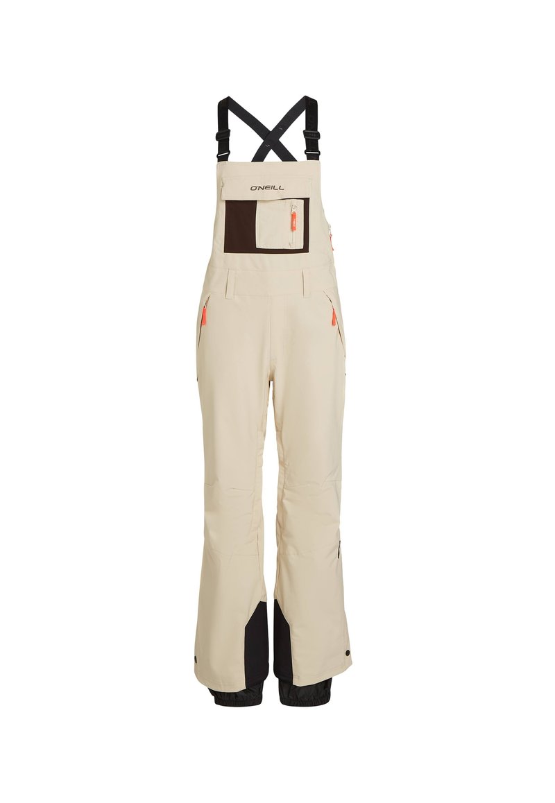 Beige Schneehose mit verstellbaren schwarzen Trägern, ausgestattet mit einer großen braunen Brusttasche, seitlichen Reißverschlusstaschen und schwarzen Akzenten im unteren Bereich.